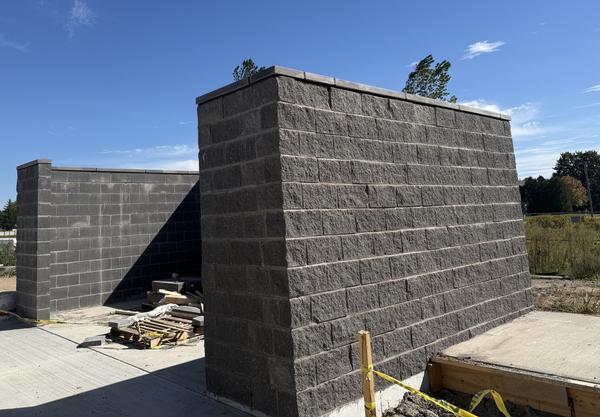 Split-face block walls with caps
