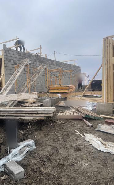 Block wall going up, with scaffold