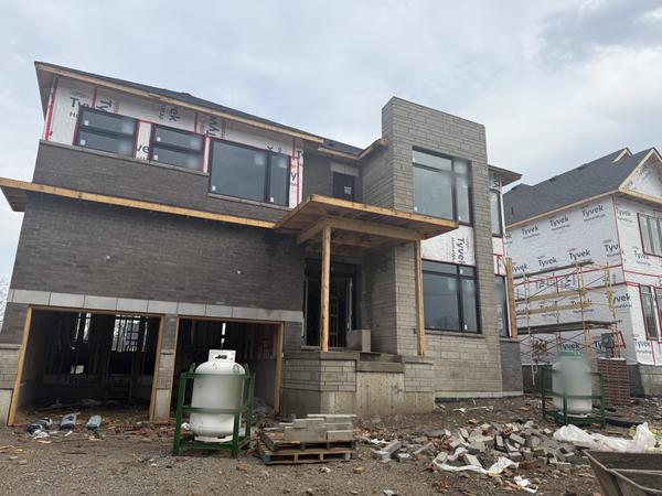 Brick and block veneer, modern custom home