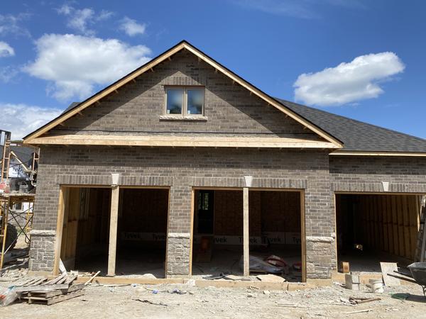 Brick and stone garage front, residential