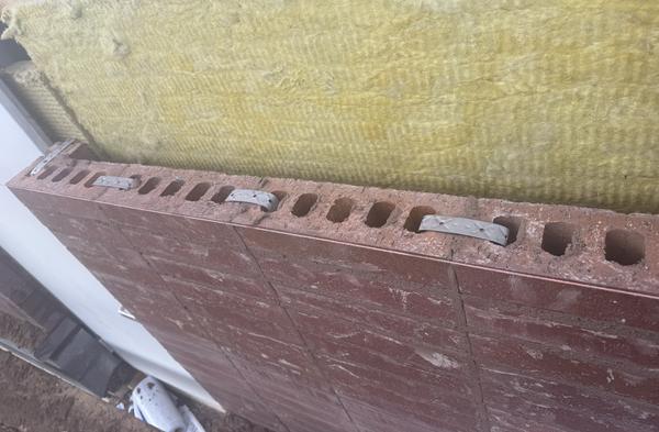 Brick veneer with ties and Rockwool cavity insulation