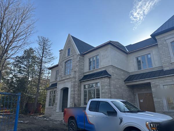 Cut stone veneer, custom home