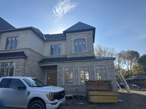 Cut stone veneer, custom home, side view