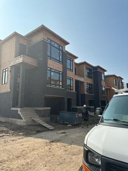 Dark brick veneer, townhouses