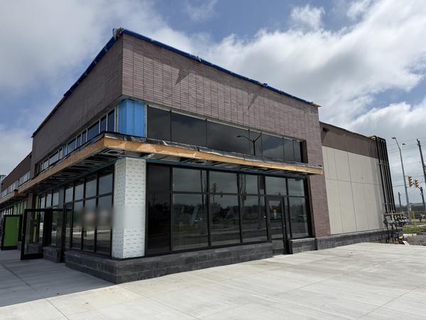 Brick corner retail unit with block base
