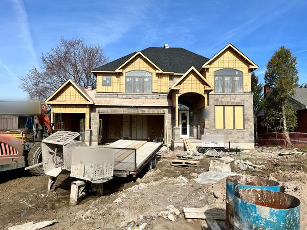 Stone veneer front, home under construction
