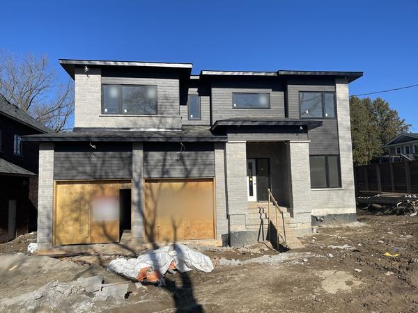 Stone veneer, modern custom home