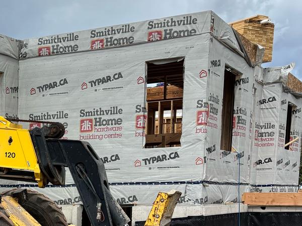 Wood framing in house wrap